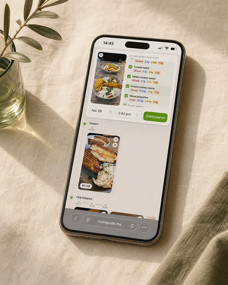 Phone showing the Nutriguide food journal — a plated meal scanned and ready to log to today.